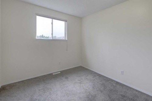 57 Sandpiper Lane Nw, Calgary, AB - Indoor Photo Showing Other Room