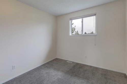 57 Sandpiper Lane Nw, Calgary, AB - Indoor Photo Showing Other Room