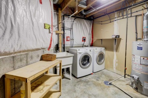 57 Sandpiper Lane Nw, Calgary, AB - Indoor Photo Showing Laundry Room