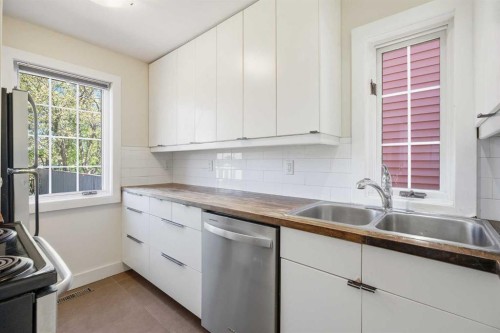 224 30 Avenue Ne, Calgary, AB - Indoor Photo Showing Kitchen With Double Sink