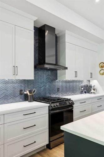 176 Cranbrook Drive Se, Calgary, AB - Indoor Photo Showing Kitchen With Upgraded Kitchen