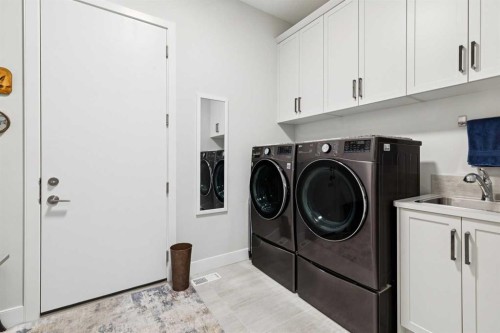 176 Cranbrook Drive Se, Calgary, AB - Indoor Photo Showing Laundry Room