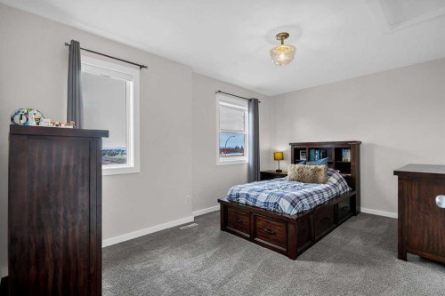 322 Tuscany Drive Nw, Calgary, AB - Indoor Photo Showing Bedroom