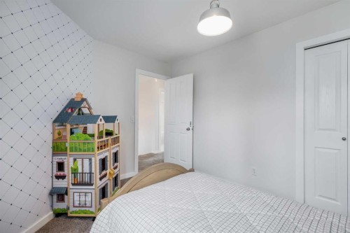 322 Tuscany Drive Nw, Calgary, AB - Indoor Photo Showing Bedroom