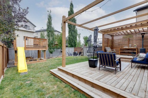 322 Tuscany Drive Nw, Calgary, AB - Outdoor With Deck Patio Veranda With Exterior