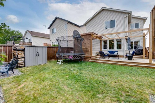 322 Tuscany Drive Nw, Calgary, AB - Outdoor With Deck Patio Veranda With Exterior
