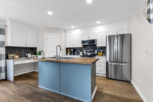 322 Tuscany Drive Nw, Calgary, AB - Indoor Photo Showing Kitchen With Stainless Steel Kitchen With Upgraded Kitchen