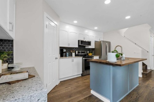 322 Tuscany Drive Nw, Calgary, AB - Indoor Photo Showing Kitchen With Stainless Steel Kitchen With Upgraded Kitchen