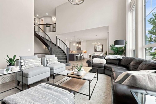 41 Whispering Springs Way, Heritage Pointe, AB - Indoor Photo Showing Living Room