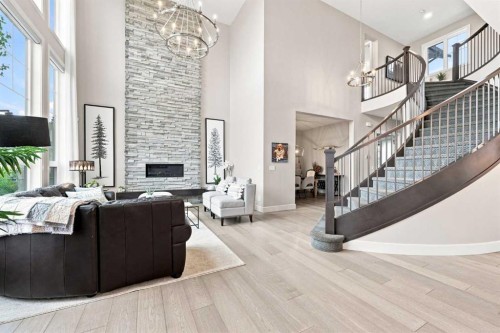 41 Whispering Springs Way, Heritage Pointe, AB - Indoor With Fireplace