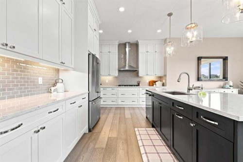 41 Whispering Springs Way, Heritage Pointe, AB - Indoor Photo Showing Kitchen With Upgraded Kitchen