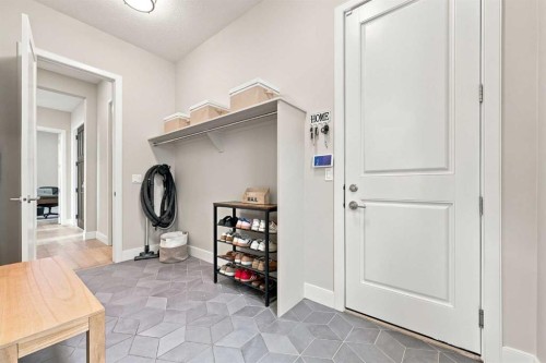 41 Whispering Springs Way, Heritage Pointe, AB - Indoor Photo Showing Other Room
