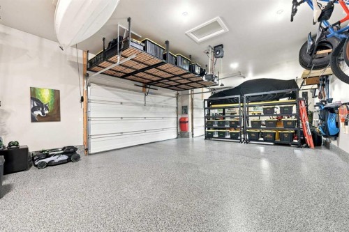 41 Whispering Springs Way, Heritage Pointe, AB - Indoor Photo Showing Garage
