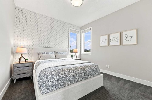 41 Whispering Springs Way, Heritage Pointe, AB - Indoor Photo Showing Bedroom