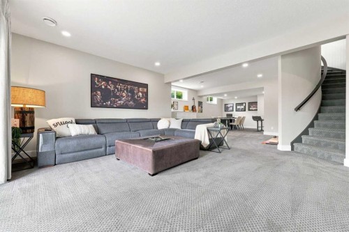 41 Whispering Springs Way, Heritage Pointe, AB - Indoor Photo Showing Living Room
