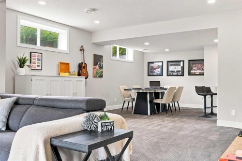 41 Whispering Springs Way, Heritage Pointe, AB - Indoor Photo Showing Living Room