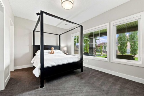 41 Whispering Springs Way, Heritage Pointe, AB - Indoor Photo Showing Bedroom