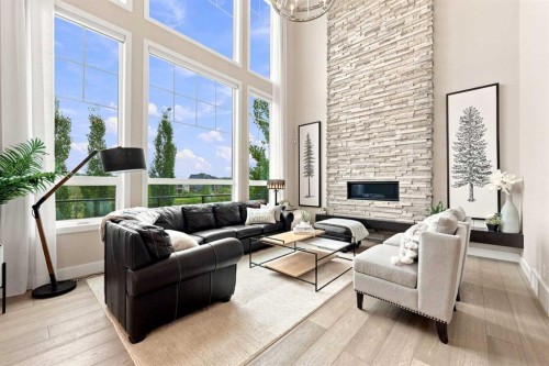 41 Whispering Springs Way, Heritage Pointe, AB - Indoor Photo Showing Other Room With Fireplace
