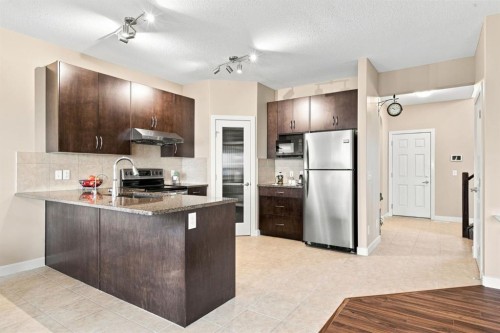 58 Everwoods Park Sw, Calgary, AB - Indoor Photo Showing Kitchen With Stainless Steel Kitchen