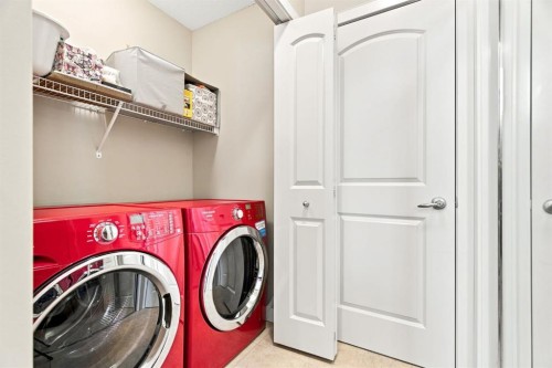 58 Everwoods Park Sw, Calgary, AB - Indoor Photo Showing Laundry Room