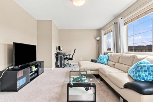 58 Everwoods Park Sw, Calgary, AB - Indoor Photo Showing Living Room