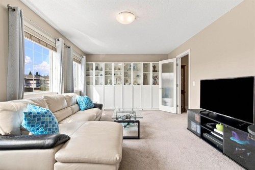 58 Everwoods Park Sw, Calgary, AB - Indoor Photo Showing Living Room