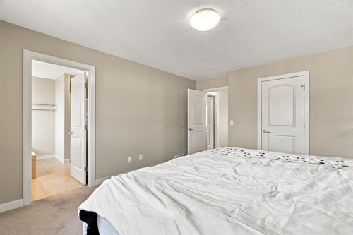58 Everwoods Park Sw, Calgary, AB - Indoor Photo Showing Bedroom