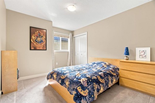 58 Everwoods Park Sw, Calgary, AB - Indoor Photo Showing Bedroom