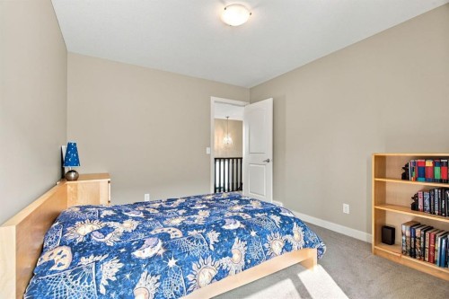 58 Everwoods Park Sw, Calgary, AB - Indoor Photo Showing Bedroom