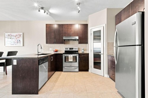 58 Everwoods Park Sw, Calgary, AB - Indoor Photo Showing Kitchen With Stainless Steel Kitchen With Upgraded Kitchen