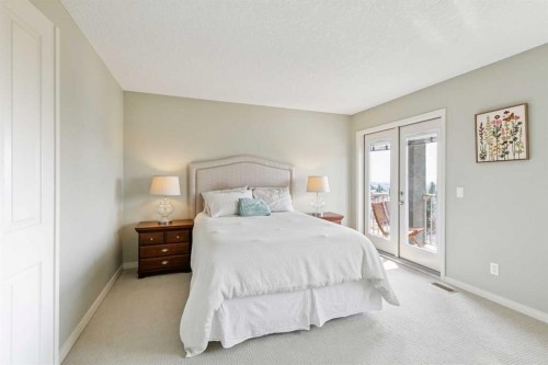 7520 Springbank Way Sw, Calgary, AB - Indoor Photo Showing Bedroom