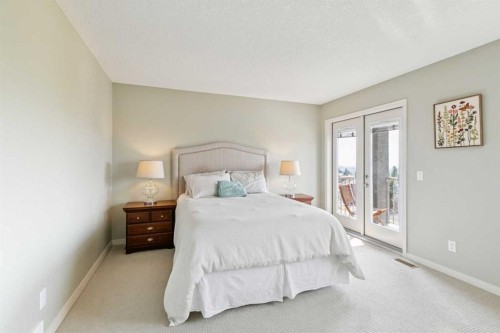 7520 Springbank Way Sw, Calgary, AB - Indoor Photo Showing Bedroom