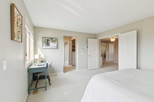 7520 Springbank Way Sw, Calgary, AB - Indoor Photo Showing Bedroom