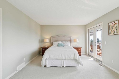 7520 Springbank Way Sw, Calgary, AB - Indoor Photo Showing Bedroom