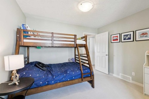 7520 Springbank Way Sw, Calgary, AB - Indoor Photo Showing Bedroom