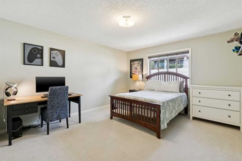 7520 Springbank Way Sw, Calgary, AB - Indoor Photo Showing Bedroom