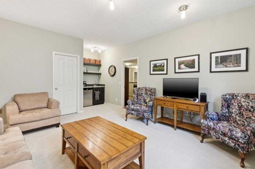 7520 Springbank Way Sw, Calgary, AB - Indoor Photo Showing Living Room