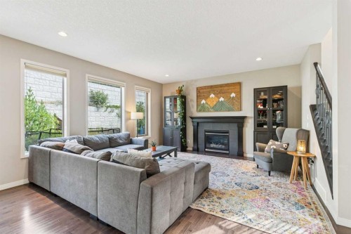 7520 Springbank Way Sw, Calgary, AB - Indoor Photo Showing Living Room With Fireplace