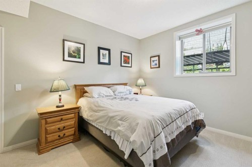 7520 Springbank Way Sw, Calgary, AB - Indoor Photo Showing Bedroom