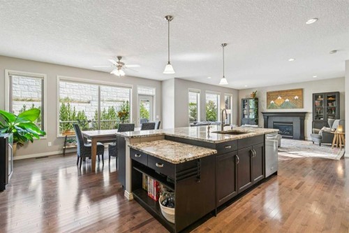 7520 Springbank Way Sw, Calgary, AB - Indoor With Fireplace