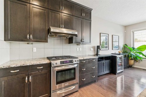 7520 Springbank Way Sw, Calgary, AB - Indoor Photo Showing Kitchen With Upgraded Kitchen