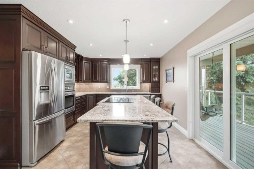 282184 Range Road 31, Rural Rocky View County, AB - Indoor Photo Showing Kitchen With Upgraded Kitchen
