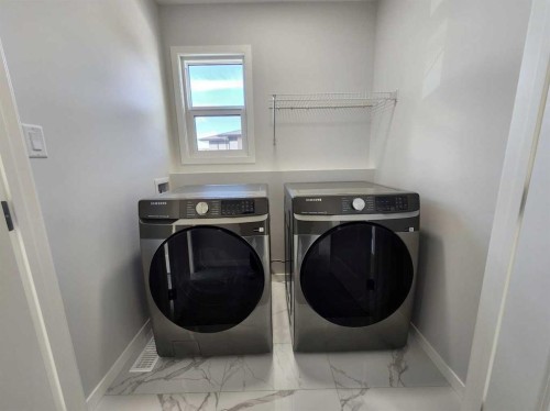 364 Herron Landing Ne, Calgary, AB - Indoor Photo Showing Laundry Room