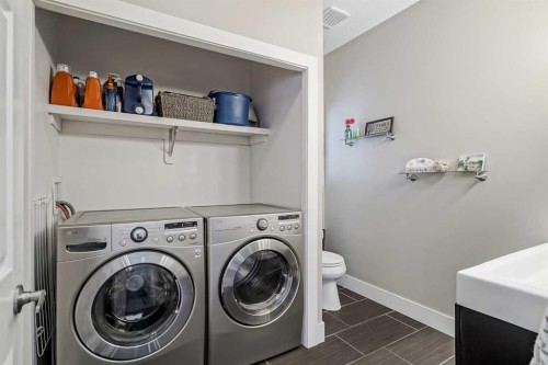 260 Chaparral Ridge Circle Se, Calgary, AB - Indoor Photo Showing Laundry Room