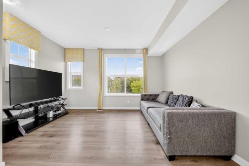 87 Legacy View Se, Calgary, AB - Indoor Photo Showing Living Room