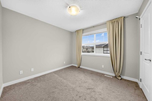87 Legacy View Se, Calgary, AB - Indoor Photo Showing Other Room