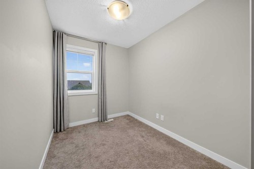 87 Legacy View Se, Calgary, AB - Indoor Photo Showing Other Room