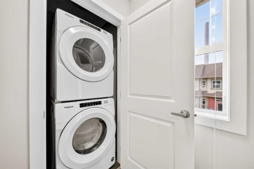 87 Legacy View Se, Calgary, AB - Indoor Photo Showing Laundry Room