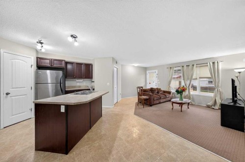#104-20 Panatella Landing Nw, Calgary, AB - Indoor Photo Showing Kitchen