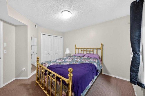 #104-20 Panatella Landing Nw, Calgary, AB - Indoor Photo Showing Bedroom